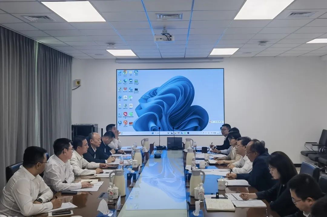 公司主要领导会见中国农垦集团党委书记、董事长张磊